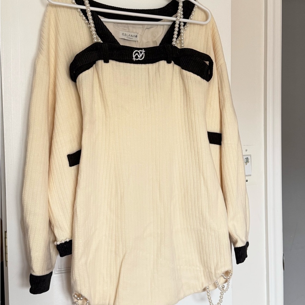 Ozlana Cream and Black Sweater with Pearl Trim
